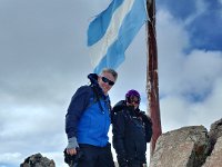 At the highest point of Cerro Catedral.  Leaning forward to keep from getting blown off.